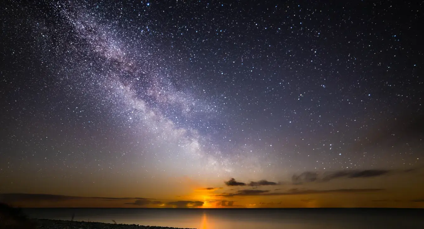 Moon rising under Milky Way